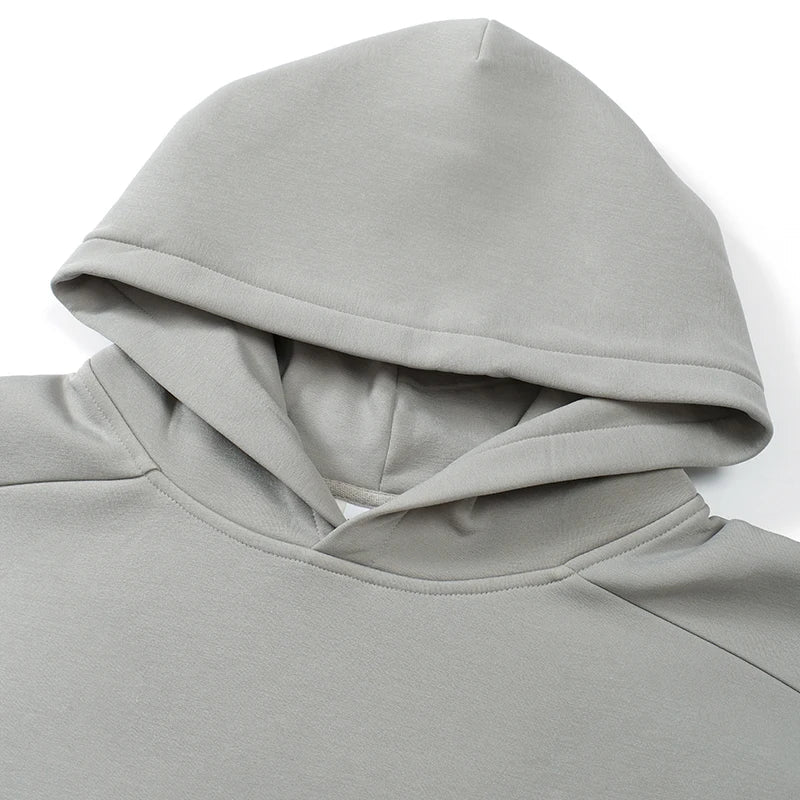 Sudadera con capucha de color liso de tejido grueso