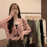 Schmale, einfarbige Strickjacke