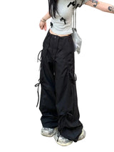 Model wearing the black Tailored Cargo Utility Pants