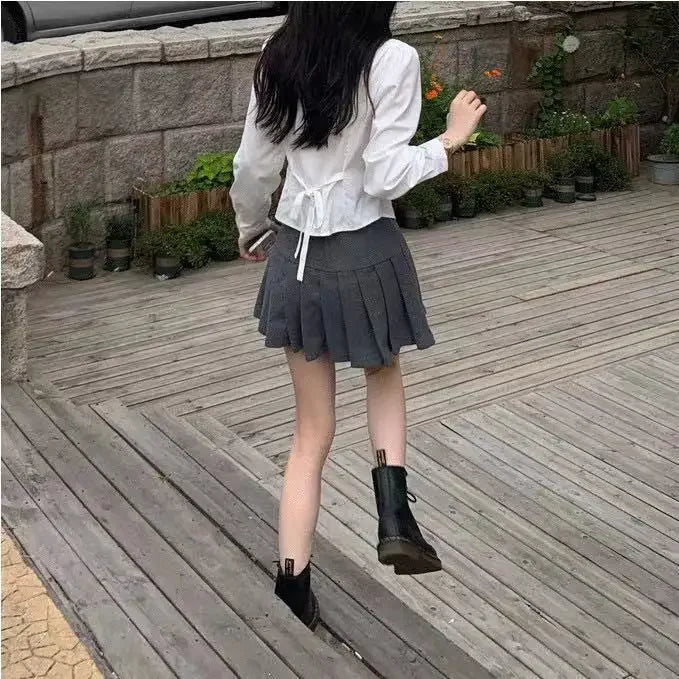 Camisa de manga larga coqueta con vendaje básico