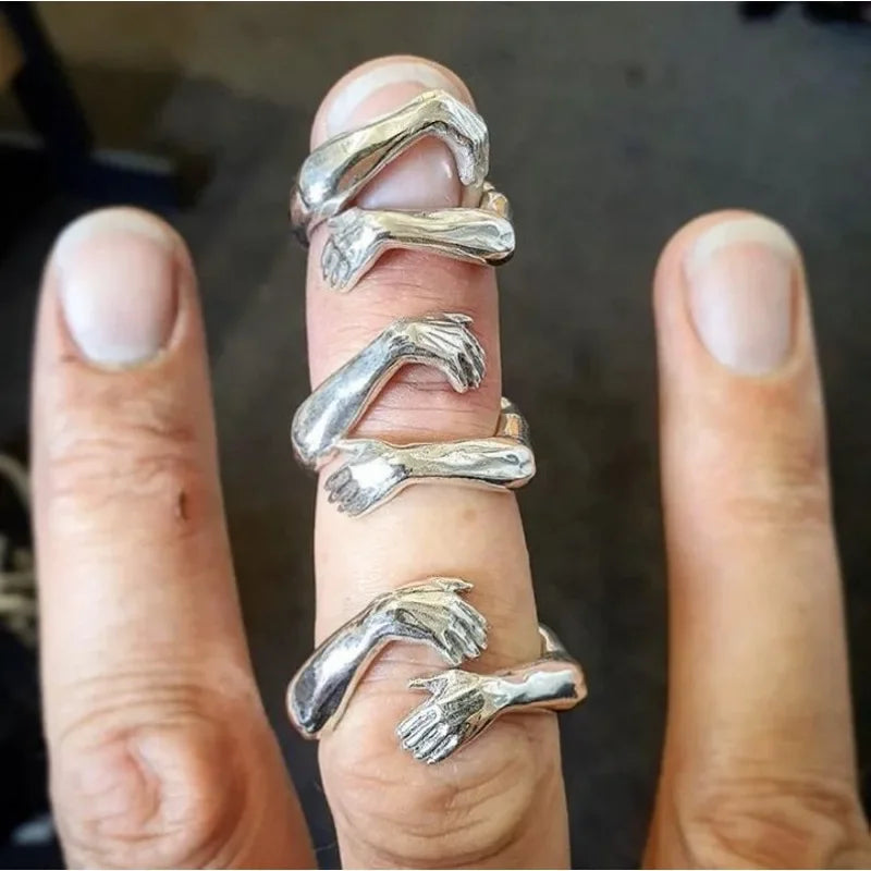 Anillo de manos haciendo signos