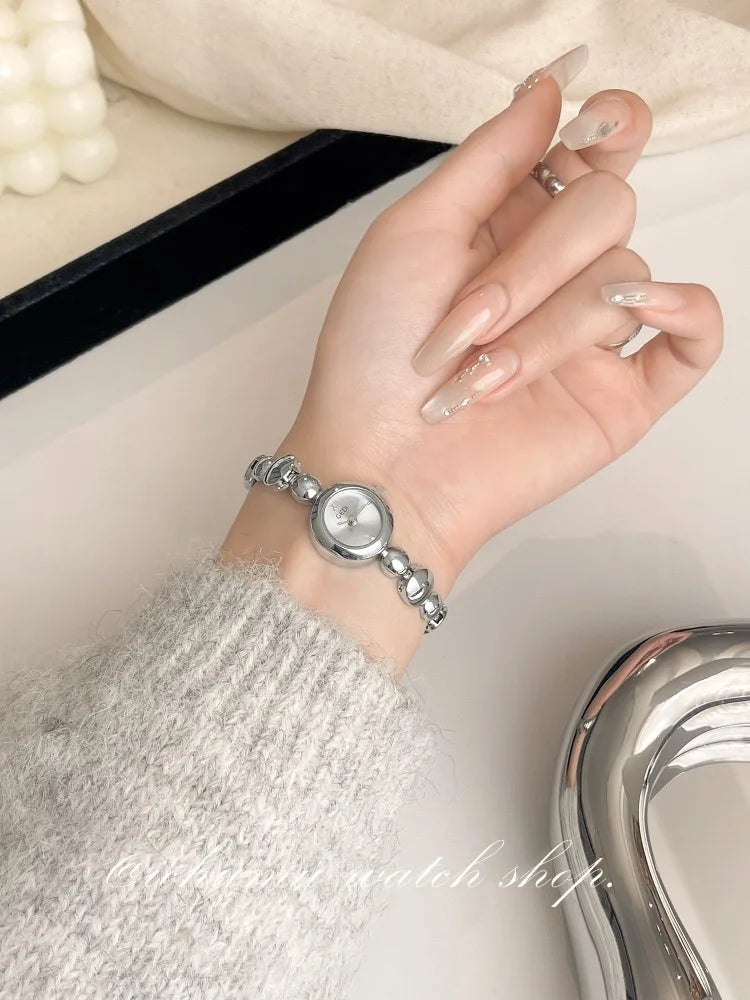 Ladies Silver Bracelet Round Quartz Watch