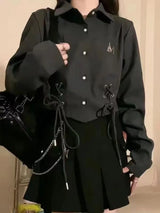 Schwarzes lässiges Verband-Langarmshirt