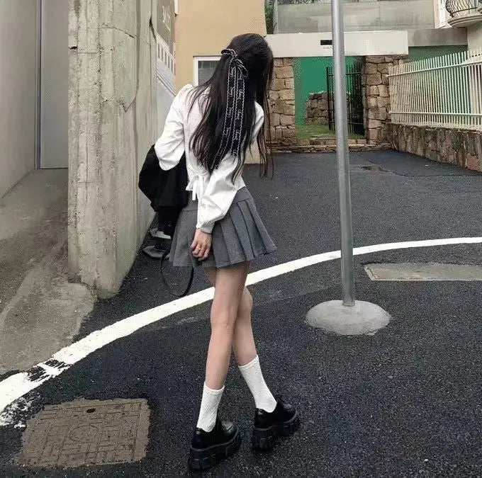Camisa de manga larga coqueta con vendaje básico
