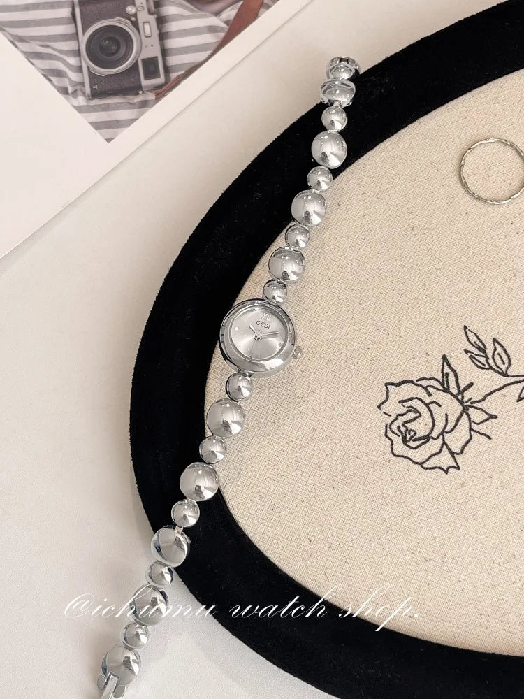 Ladies Silver Bracelet Round Quartz Watch