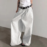Pantalones anchos de un solo color con botones