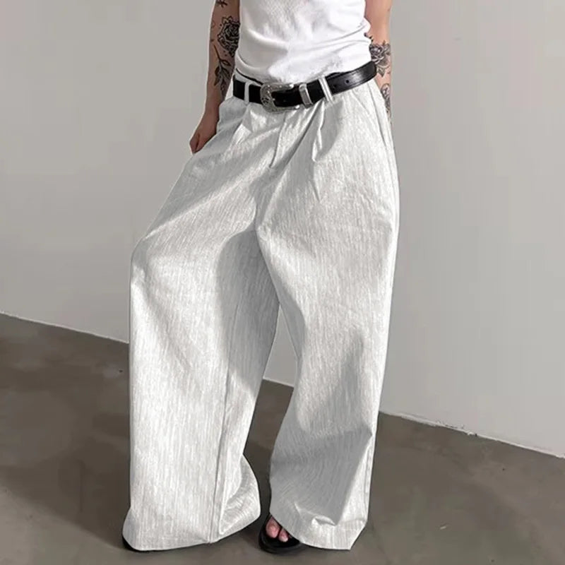 Pantalones anchos de un solo color con botones