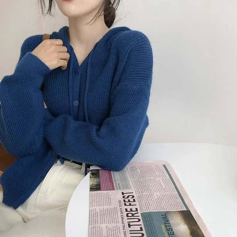 Model wearing the blue Knitted Hooded Sweater 