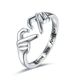 Anillo de manos haciendo signos