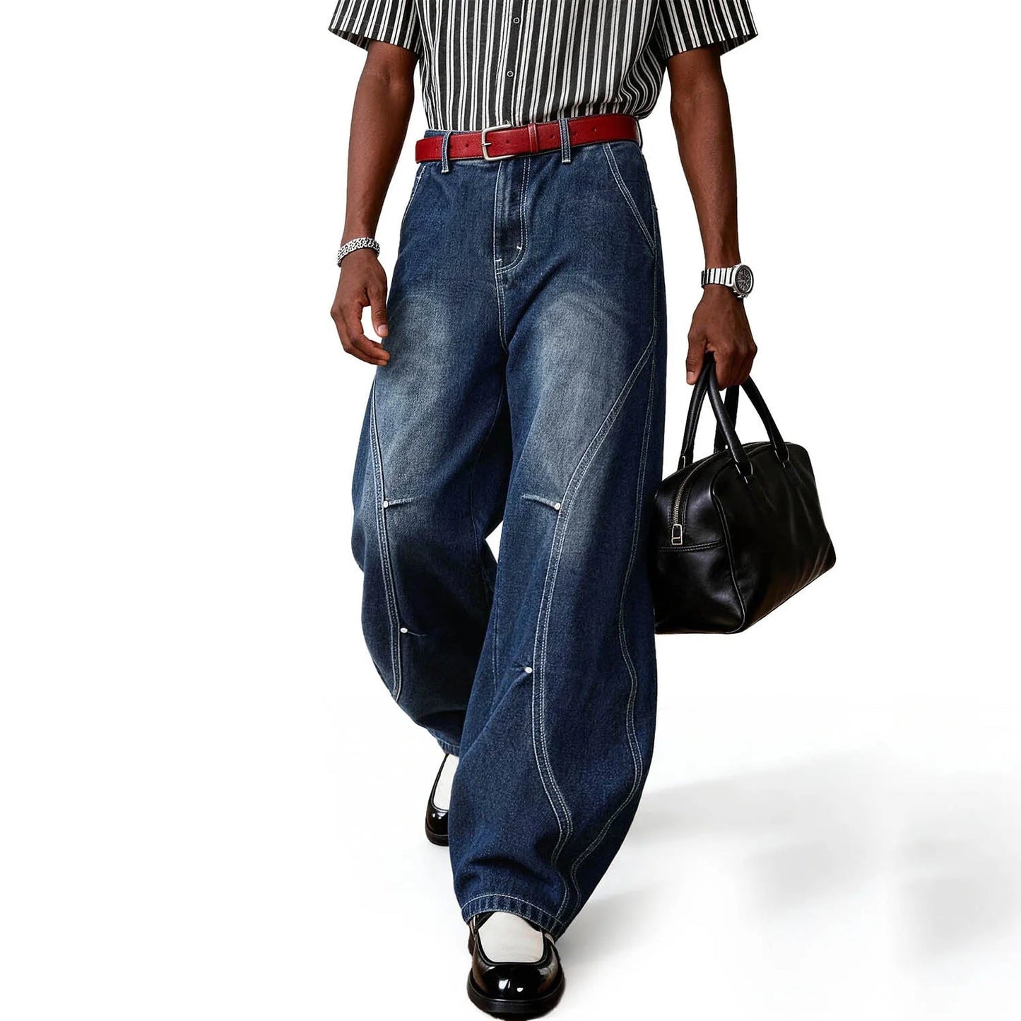 A person wearing blue splicing ultra baggy wide leg jeans.