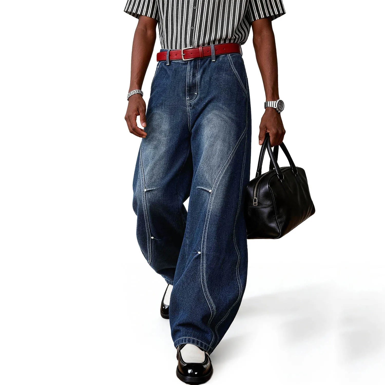 A person wearing blue splicing ultra baggy wide leg jeans.