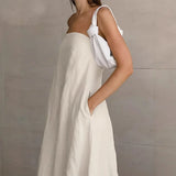 Maxivestido de lino sin tirantes y con cuello halter
