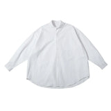 Camisa informal de algodón liso de corte holgado