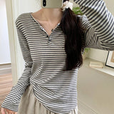 Camiseta de manga larga a rayas para mujer