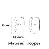 Silberner geometrischer Herzohrring