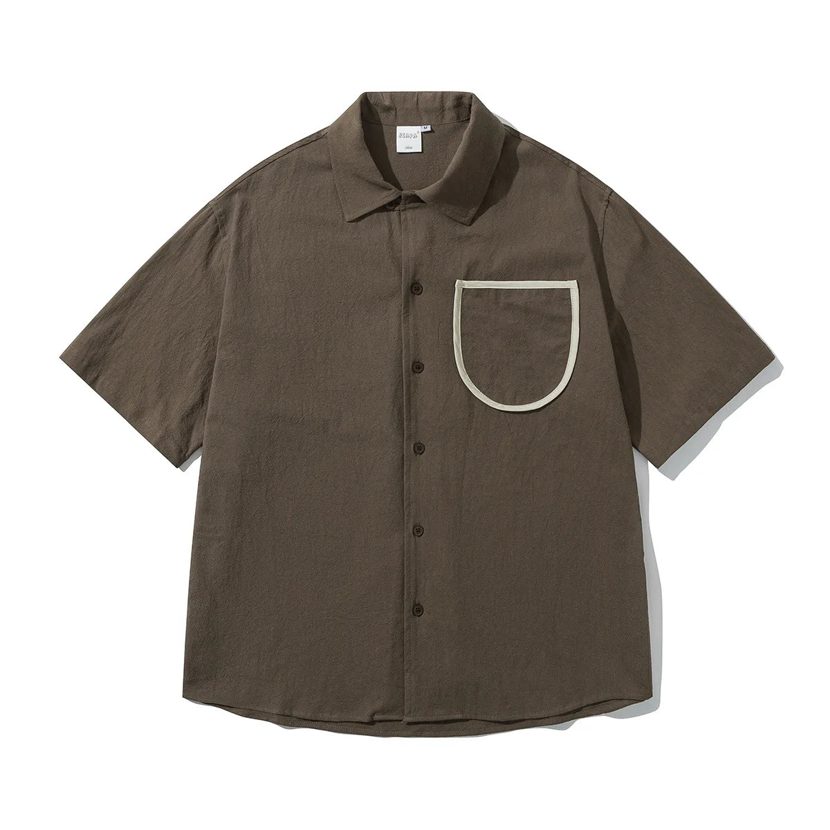 Camisa de algodón de manga corta con bolsillo delantero suelto