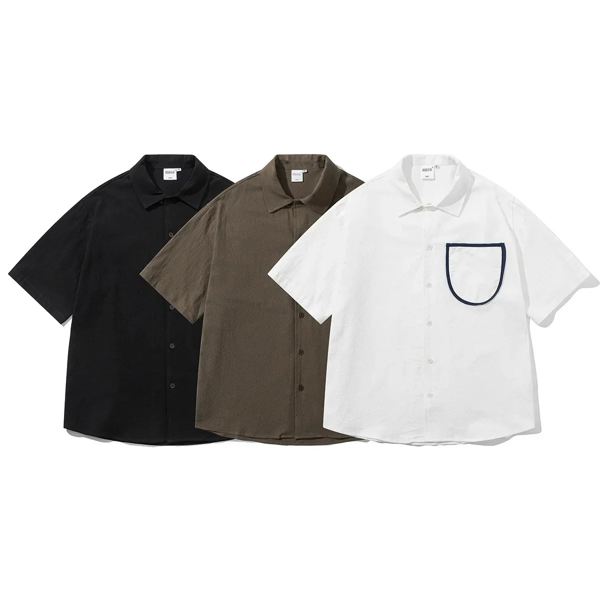 Camisa de algodón de manga corta con bolsillo delantero suelto
