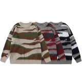 Wellenförmiger Pullover mit Kontraststreifen und Farbverlauf