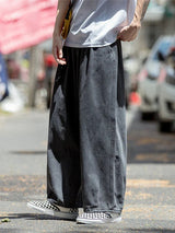 Pantalones de mezclilla de pierna ancha de corte holgado