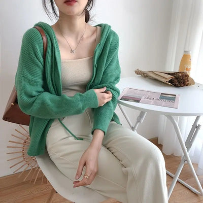 Model wearing the green Knitted Hooded Sweater 
