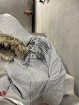 Sudadera con capucha y cuello de piel sintética