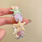 Überzogenes Seestern-Muschelarmband