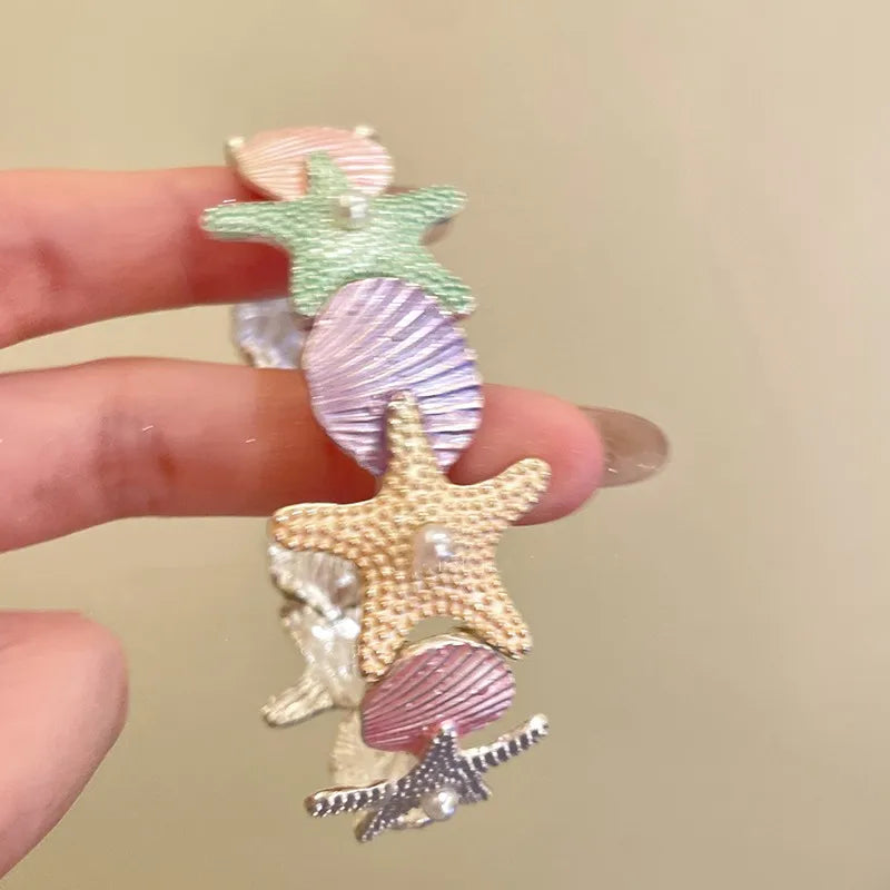 Überzogenes Seestern-Muschelarmband