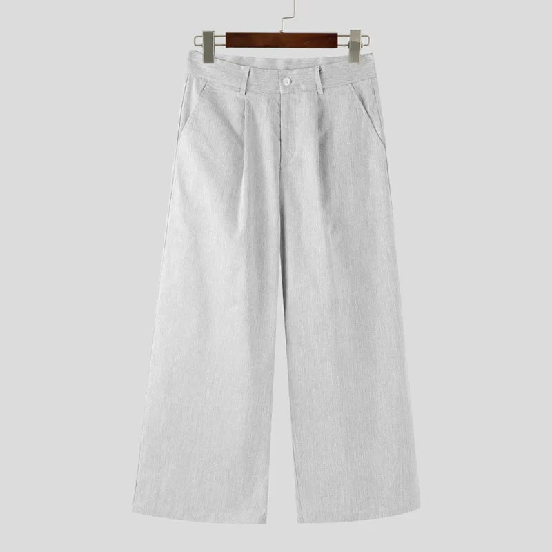 Pantalones anchos de un solo color con botones