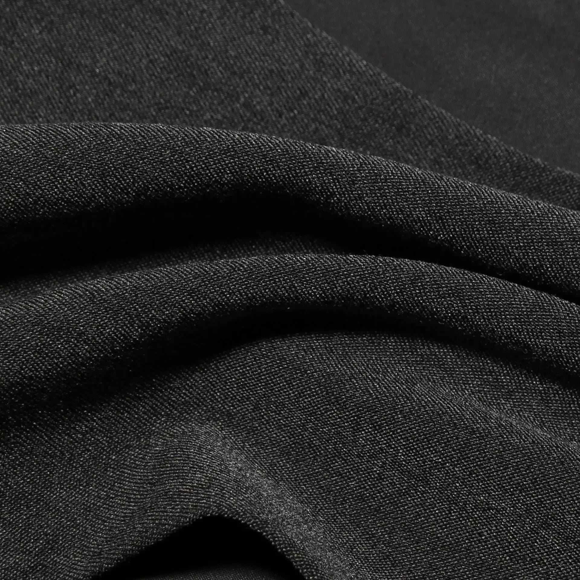 Close-up of dark gray fabric texture