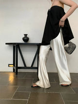 Elegante Satinhose mit weitem Bein