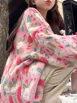 Model wearing the pink Floral Knit Buttoned Sweater