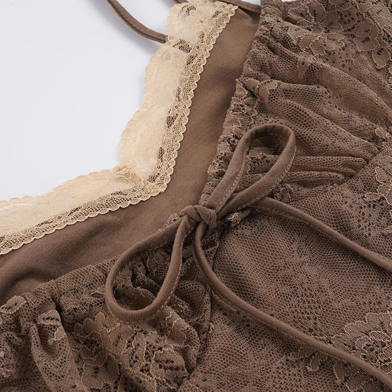 Brown lace top with a close-up of the neckline and straps on a light gray background