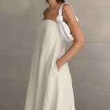 Maxivestido de lino sin tirantes y con cuello halter