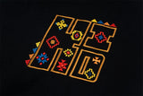 Camiseta geométrica con cuello redondo y bordados