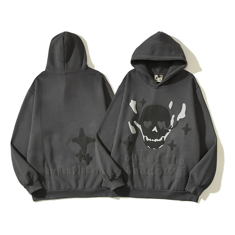 Sudadera gótica con capucha y calavera de llamas espumosas
