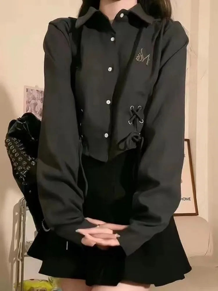 Schwarzes lässiges Verband-Langarmshirt
