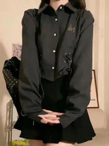 Schwarzes lässiges Verband-Langarmshirt