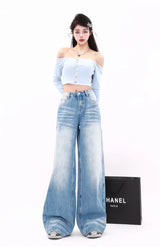Model wearing the blue Relaxed Wide-Leg Jeans