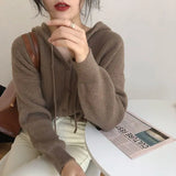 Model wearing the coffee Knitted Hooded Sweater 