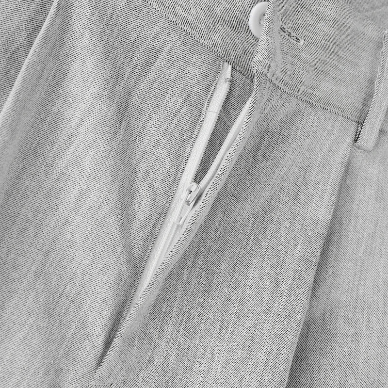 Pantalones anchos de un solo color con botones