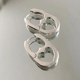 Silberner geometrischer Herzohrring