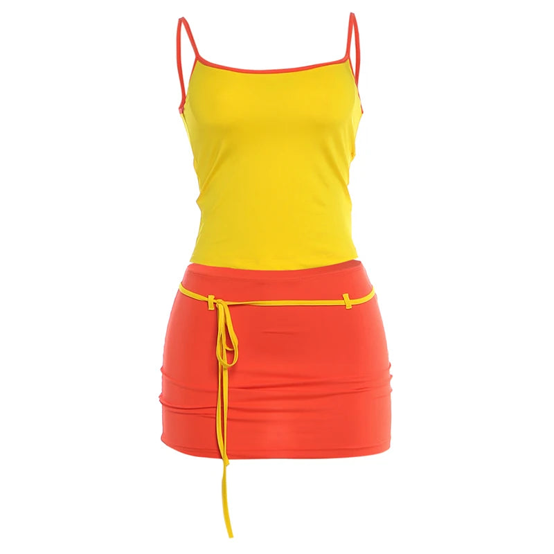 Yellow tank top and red skirt set on a white background