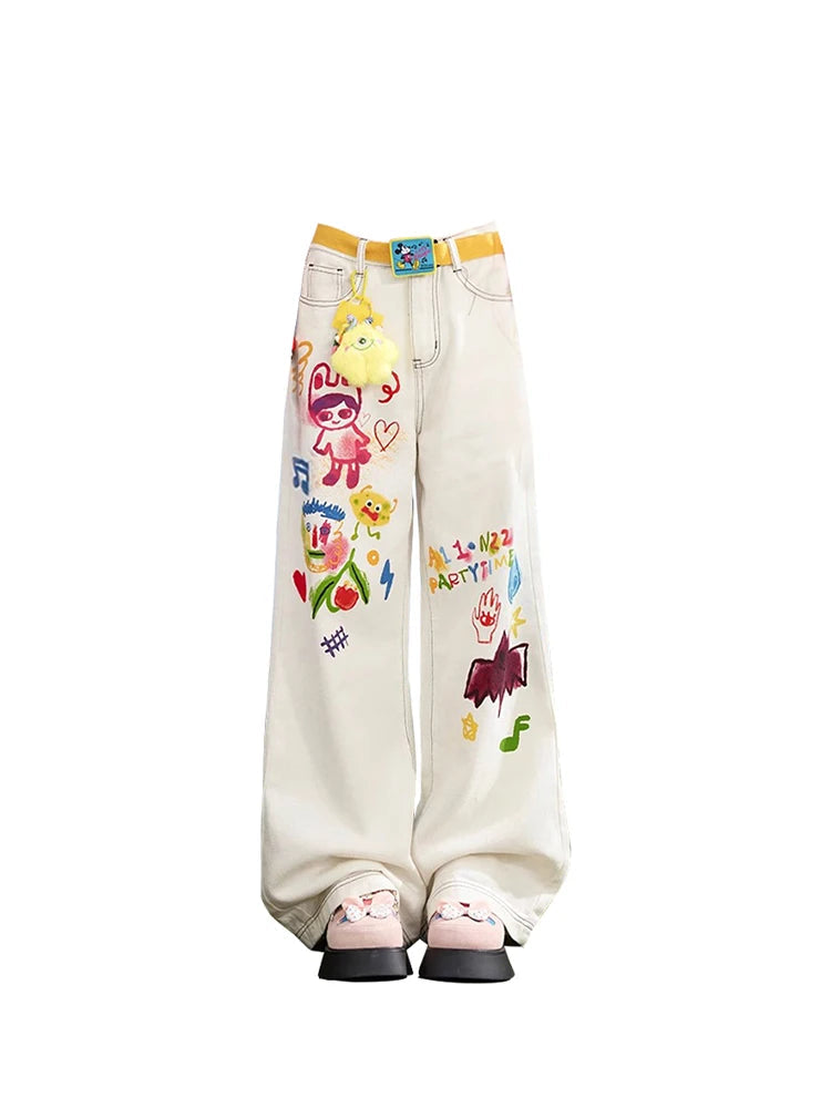 Indie aesthetic beige graffiti straight leg jeans.