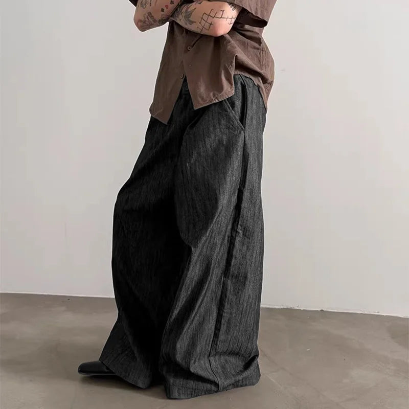 Pantalones anchos de un solo color con botones