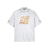 Camiseta geométrica con cuello redondo y bordados