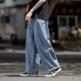 Pantalones de mezclilla de pierna ancha de corte holgado