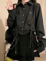 Schwarzes lässiges Verband-Langarmshirt
