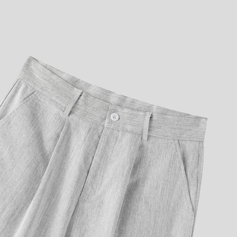 Pantalones anchos de un solo color con botones