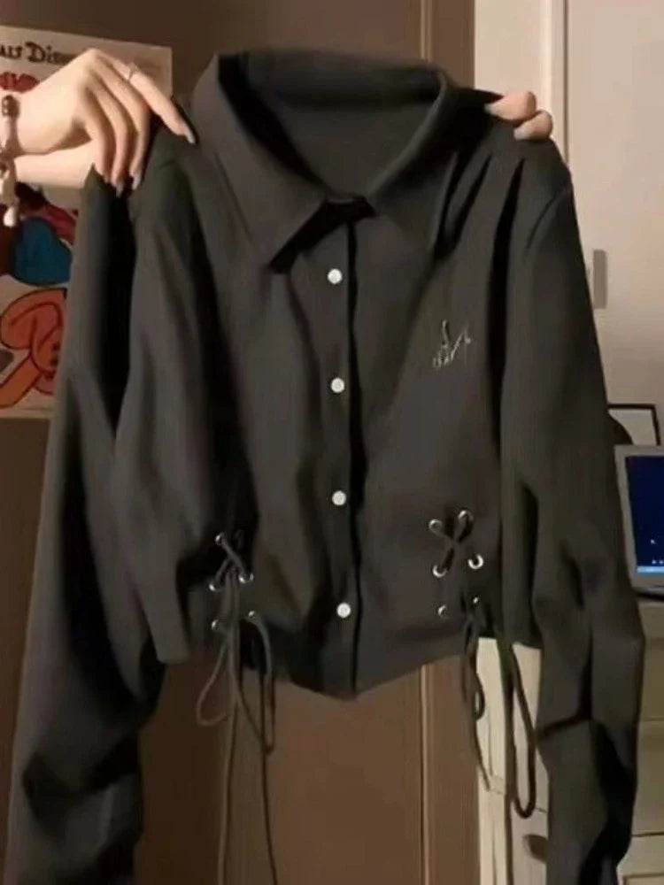 Schwarzes lässiges Verband-Langarmshirt