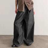 Pantalones anchos de un solo color con botones